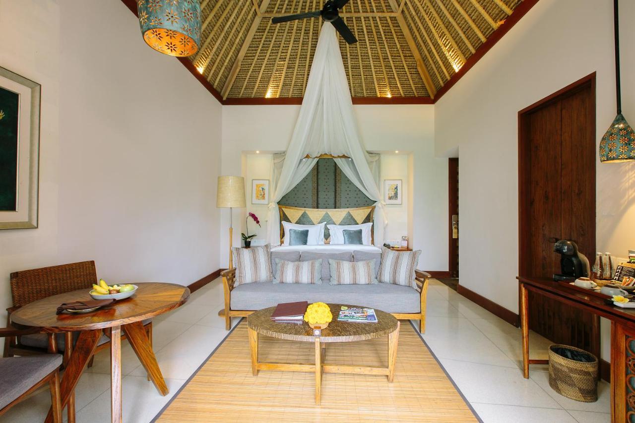 เตชาปรานา รีสอร์ต แอนด์ สปา Hotel อูบุด ภายนอก รูปภาพ A room at the resort
