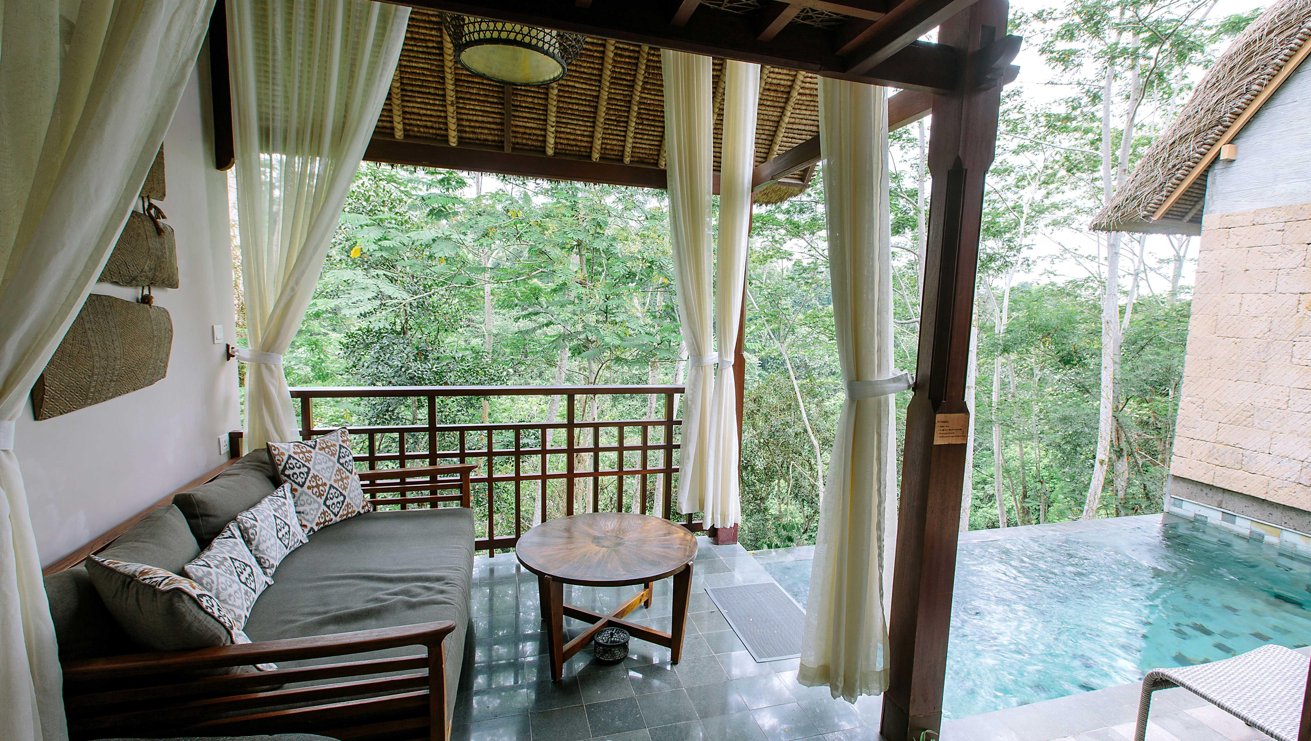 เตชาปรานา รีสอร์ต แอนด์ สปา Hotel อูบุด ภายนอก รูปภาพ A view of the pool at the resort
